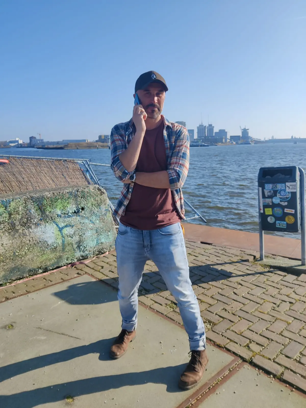 Will Falkowski at the Amsterdam waterfront at sunrise
